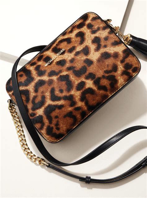 michael kors calf hair crossbody|Michael Kors leopard handbag.